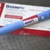 Ozempic injection pen next to a diabetes-friendly meal